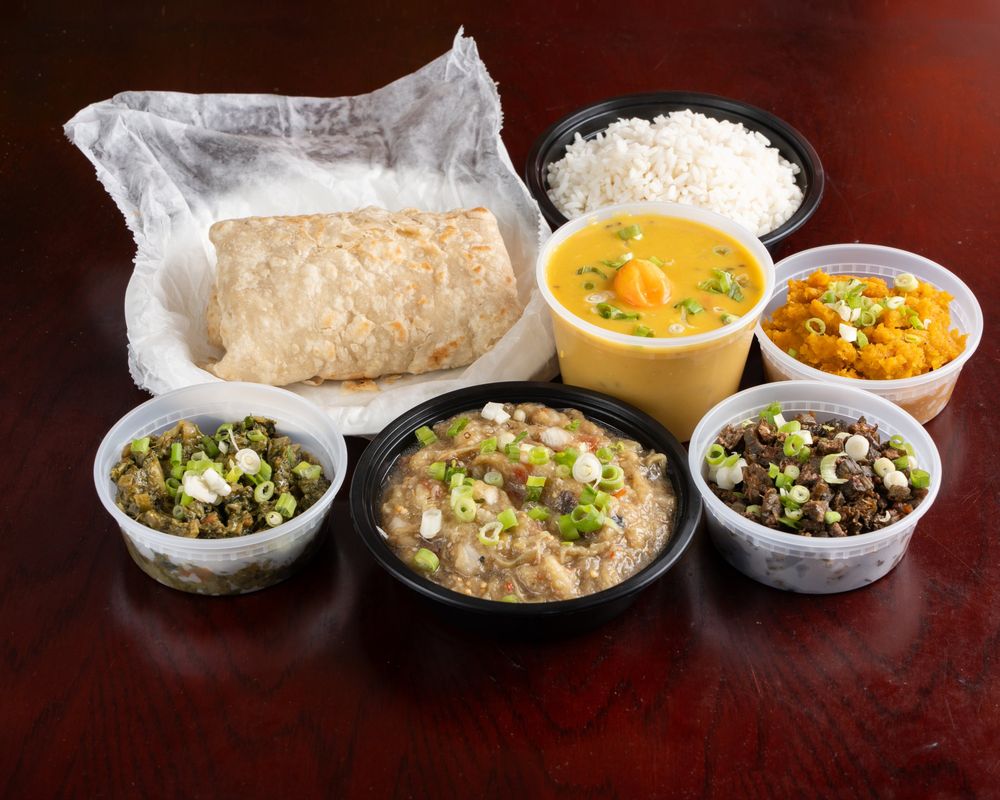 Vegetable combo with roti, dhal, pumpkin, calaloo and bora